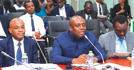 Thomas Nyarko-Ampem (middle), Deputy Minister of Finance, answering questions at the Public Accounts Committee of Parliament. With him are Isaac Fraikue (right), Director, Budget Office, and Jacob Ahadzi (left), Director, Internal Audit, Ministry of Finance.  Picture: ELVIS NII NOI DOWUONA