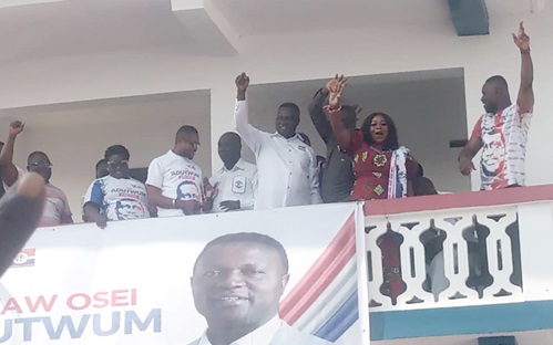Dr Yaw Osei Adutwum (arrowed) acknowledging cheers from his supporters 