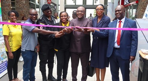 Dr James Orleans-Lindsay (3rd from right), President, Ghana Real Estate Developers Association, being assisted by Samuel Essel (right), Director, Finance, GCGL; Gloria Frempong (middle), Senior Manager, Data, Device and Home, MTN; COP Dr Sayibu Gariba (3rd from left) and some dignitaries to cut the tape to open the Graphic-GREDA Home Fair 2025. Picture: ELVIS NII NOI DOWUONA