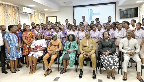 Dr Joseph Whittal (seated 3rd from right), Commissioner, CHRAJ;  Terence Addey Adams (right), Police CID HQ, with participants in the event