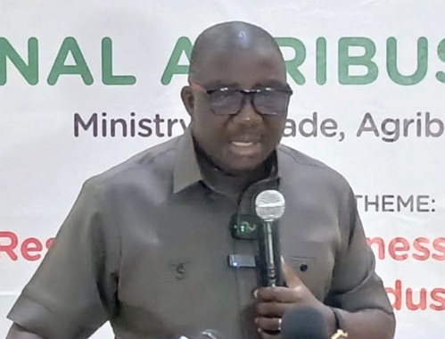 Daniel Acquaye (left), Group CEO of Agri-Impact Limited, speaking at the event