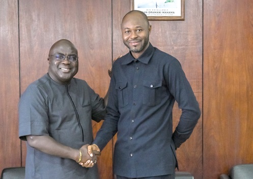 Julius Debrah (left), Chief of Staff, with Latif Abubakar after their meeting