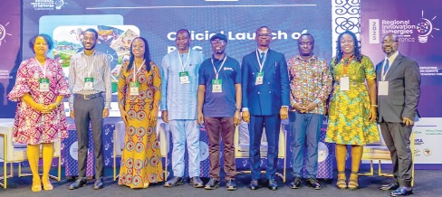 Dr Adelina Mensah (left), Deputy Director of Operations at ACC UG; Gameli Adzaho (2nd from left), Country Technical Lead, RISA Fund; Prof. Richmond Aryeetey (5th from left), Nkabom Collaborative Lead, with other dignitaries at the launch of the conference