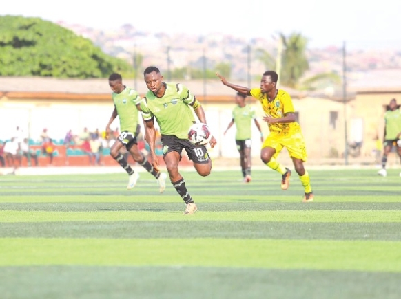 Esso, Dreams FC's lone-goal hero, breaking away with the ball into the half of Basake Holy Stars during yesterday's clash at Tuba