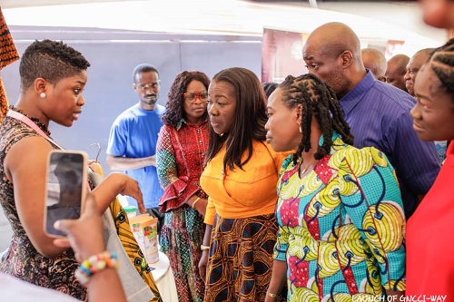 Elizabeth Ofosu-Adjare (3rd from right), Minister of Trade, Agribusiness and Industry, interacting with some participants and exhibitors at the forum