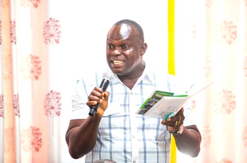  Dr Solomon Gyan Ansah (right), Director of Crop Services at the Ministry of Food and Agriculture, addressing participants in the training