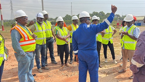 An engineer of WAPCo explaining the dynamics of the pigging process to journalists