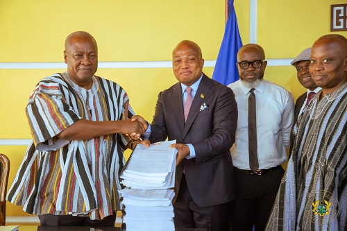 Samuel Okudzeto Ablakwa (4th from right), Chairman of Operation Recover All Loot (ORAL), submitting the report to President John Dramani Mahama. Those with them are members of the ORAL team