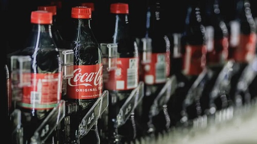 Beverage giant's boss says his company may need to action if aluminium cans become more expensive