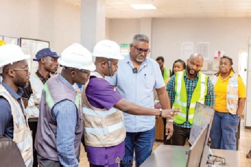 Godwin Kudzo Tameklo (3rd from left), acting CEO, National Petroleum Authority, seeking clarification to a point during his tour of TOR