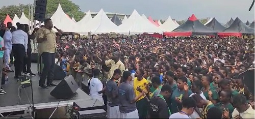 Bishop Robinson (left) engaging the students at the crusade