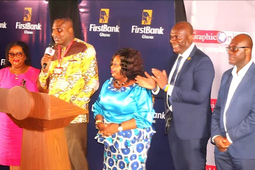  Franklin Sowa (2nd from left), Director, Marketing and Sales of GCGL, and Hannah Acheampong Amoah  (left), Editor, Junior Graphic, launching the Junior Graphic National Essay Competition. With them are Theresa Tetteh (middle), Municipal Director of Education, Ledzokuku Teshie; Enoch Vanderpuye (2nd from right), Country Team Lead, Marketing and Corporate Communications, FirstBank Ghana, and Samuel Essel (right), Director, Finance &amp; Admin, GCGL Picture: ESTHER ADJORKOR ADJEI 