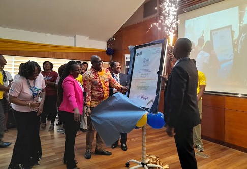  Dr Ibrahim Murtala Muhammed (3rd from left), Minister of Environment, Science and Technology, unveiling the ISO 15189-2022 certification of the Noguchi Memorial Institute for Medical Research. Looking on are Prof. Dorothy Yeboah-Manu (2nd from left), the Director of NMIMR; Prof. Alfred Yawson (4th from left), Provost, College of Health Sciences, and Prof. Dziedzom de Souza (right), Head, Clinical Pathology Department of the NMIMR