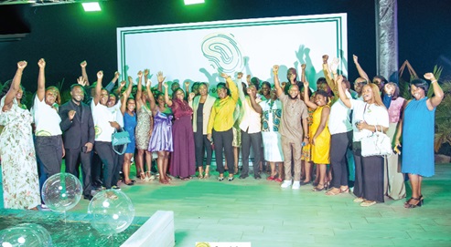  Nana Adjoa Hackman (arrowed), founder and Executive Chairperson, Drive to Inspire-Africa, awardees and volunteers cheering after the event