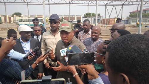 Samuel Okudzeto Ablakwa (middle), Chairman of the Operation Recover All the Loot Committee, briefing journalists during the visit to the agri-mechanisation centre at Cantonments in Accra. With him are Nathan Kofi Boakye (right), retired  Commissioner of Police; Daniel Yaw  Domelevo (left), former Auditor General, and other team members 
