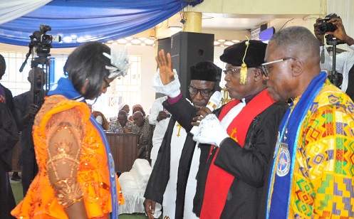 Rt Rev. Dr Lt Col. B.D.K. Agbeko (2nd from right), Moderator of the General Assembly of the EPCG, inducting Dr Salomey Praise Otami-Abutiate, Presbyter Executive of EPCG, into office