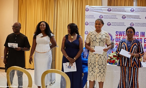 Clare Banoeng-Yakubo (right), Chairperson of GHA-CAR, with the new  executive at the ceremony