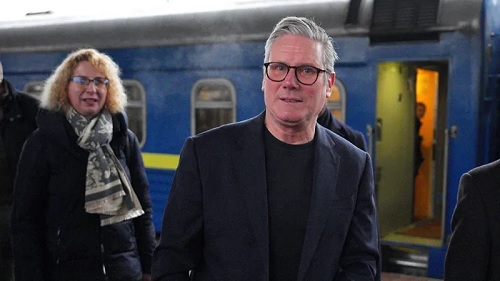The prime minister was met by officials at Kyiv railway station