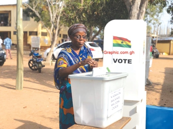 An voter casting her ballot in an election
