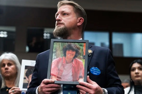 South Carolina state Rep. Brandon Guffey, holds a picture of his son Gavin Guffey, 17, who died by suicide after being entrapped in a sexual extortion scam on Instagram, during the Senate Judiciary Committee hearing titled "Big Tech and the Online Child Sexual Exploitation Crisis," in Dirksen building on Wednesday, Jan. 31, 2024. Tom Williams / AP file