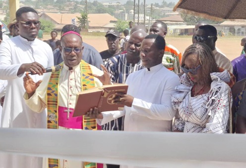 Most Rev. John Opoku Agyeman (2nd from left), Bishop of the Konongo-Mampong Diocese, dedicating the library (right)