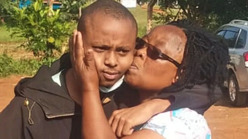 Billy Mwangi, seen here with his mother after he was freed, has been reticent about his kidnapping
