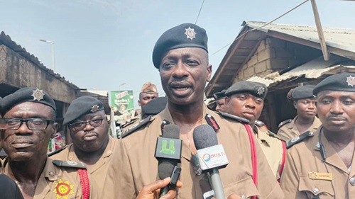  ACFO Timothy Osafo-Affum, Eastern Regional Commander of the Ghana National Fire Service, addressing market queens at the Koforidua Central Market