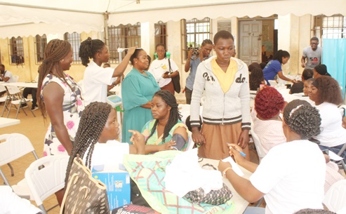 Some teachers and students from the La Nkwantanang Cluster of Schools being screened. Picture: ESTHER ADJORKOR ADJEI 