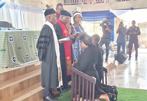 Rt Rev. Dr Lt Col Bliss Divine Agbeko (retd) [middle] performing the commissioning rites for the new pastors. With him are Rev. Dr Lawson Dzanku (left); Rev. Dr Fayose (behind the Moderator) and Dr Mrs Praise Salome Otami Abutiate (right), the E P Church Presbyter Executive