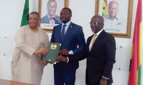 Goosie Tanoh (left), Presidential Advisor and Head of the 24 Hour Economy Secretariat, with Salawou Mike Moukaila Bamidele (2nd from left), Director of Infrastructure and Urban Development at the AfDB, and Nana Dwemoh Benneh (right), Chief Executive Officer of the GIIF, after the signing ceremony