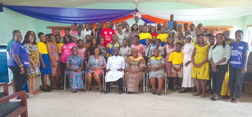 Dr Juliette Dufie Otamie (seated right), Central Regional Director, GES; Fairuza Abdul-Rashid Safian (seated 2nd from right), Executive Director of CAMFED, and Abena Adubea Amoah (seated 2nd from left), Executive Director of PPAG, with some participants in the programme