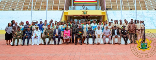 President John Dramani Mahama (middle), Vice-President Prof. Naana Jane Opoku-Agyemang (6th from left), with some government officials, the leadership of the Ghana Armed Forces and students after the event