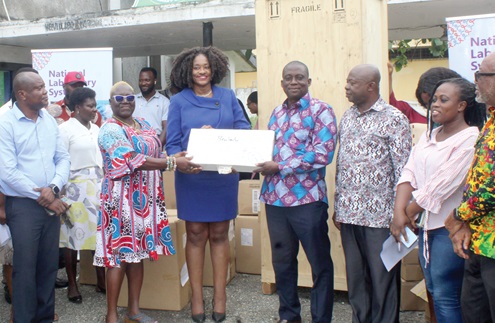 Dr Myrna D. Charles (3rd from left), West Africa Region Programme Director for Influenza, CDC Ghana, and Trudi Nunoo (middle), Project Director and Country Representative for Family Health International (FHI 360) Project/EpiC, presenting the equipment to Dr Emmanuel Cudjoe (3rd from right), Chief Veterinary Officer. With them is Dr Edward Fenteng-Danso (2nd from right), Deputy Chief Veterinary Officer.  Picture: ESTHER ADJORKOR ADJEI 