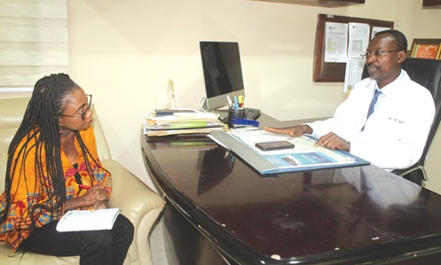 Prof. Matthew Kwame Yamoah Kyei (right) discussing a point with Augustina Tawiah, Staff Writer of the Daily Graphic. Picture: EESTHER ADJORKOR ADJEI