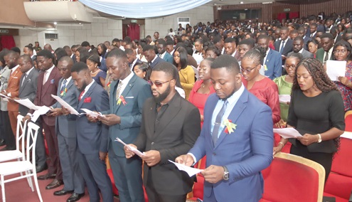 Newly qualified and registered pharmacists taking their oath during the induction ceremony. Picture: ELVIS NII NOI DOWUONA 