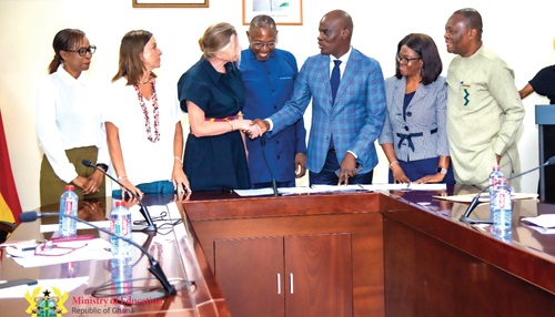 Haruna Iddrisu (3rd from right), Education Minister, exchanging pleasantries with Rebecca Stronger (3rd from left), Leader of eLearning Africa, while Dr Clement Apaak (middle), Deputy Education Minister, and other officials from the two entities look on. Promoting digital education: