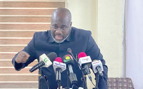 Dr John Apea, Head of Mission for the Commonwealth Enterprise and Investment Council, addressing the news conference