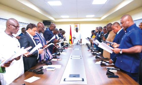 John Setor Dumelo, Deputy Minister of Food and Agriculture, swearing in the board of the Tree Crop Development Authority