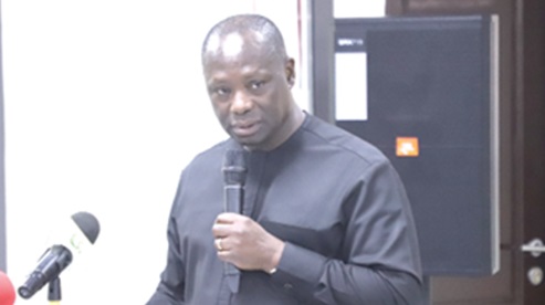 Emmanuel Armah-Kofi Buah, Minister of Lands and Natural Resources, addressing participants in the ceremony