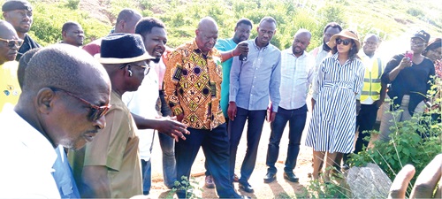 Officials being led on a tour of the Vea Irrigation Scheme