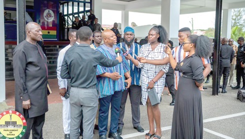 James Agalga (middle), Chairman, Parliamentary Select Committee on Defence and Interior, interacting with the media. 