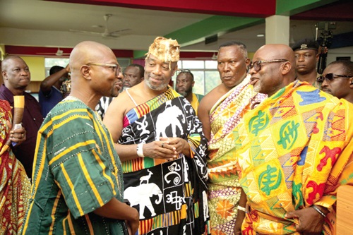  King Nii Tackie Teiko Tsuru II (2nd from left), Ga Mantse, in a conversation with Patrick Mensah (left), Headmaster of Odorgonno Senior High School, and Nii Ahene Nunoo III (right), Abola Mantse, during the inspection of the new PTA block Picture: CALEB VANDERPUYE