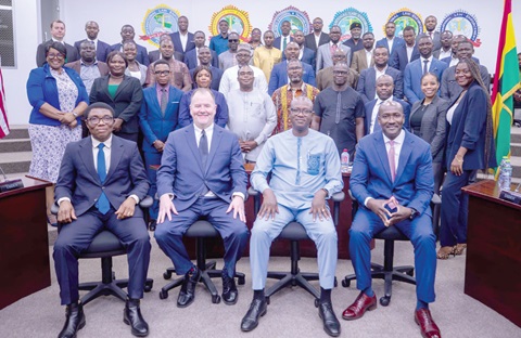 Rolf A. Olson (seated 2nd from left), Chargé d’Affaires of the US Embassy in Accra, and Charles A. Kipo (2nd from right), Director-General of the National Investigation Bureau, with the participants