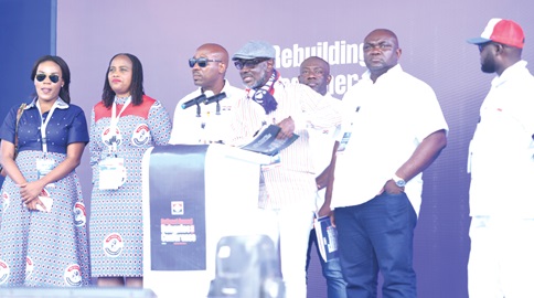Frank Davis, Chairman of the Constitutional and Legal Committee of the NPP, with members of the committee presenting the motions at the 2025 National Delegates Conference at the University of Ghana Sports Stadium. Picture: SAMUEL TEI ADANO