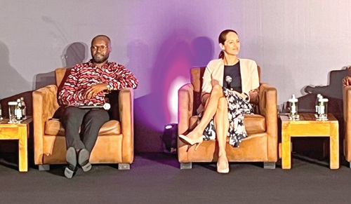 Dr Dan Armooh (left), Managing Director of Acacia Health Insurance, and Emma Knox, CEO of Vitality Health International Africa, seated during a panel discussion