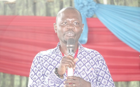 Dr Linus Linnaeus Tannor (inset), Director, Research, Ghana National Association of Teachers, Institute for Research and Industrial Relations Studies, addressing the conference. Picture:  ESTHER ADJORKOR ADJEI  