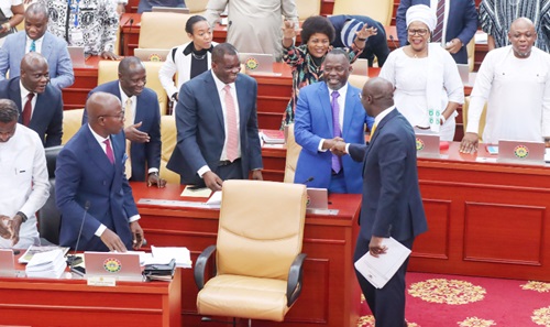 Dr Dominic Ayine (2nd from right), Attorney-General, and the other members of the Majority  side of Parliament congratulating Dr Cassiel Ato Forson (right), Minister of Finance, following his budget presentation  Picture: ELVIS NII NOI DOWUONA 