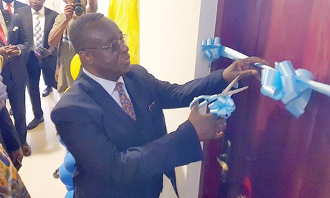 Justice Paul Baffoe-Bonnie, acting Chief Justice, cutting the ribbon to officially open the UPSA moot court. Picture:  ERNEST KODZI