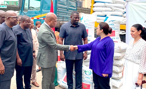 Imane Ouaadil (2nd from right), Moroccan Ambassador to Ghana, in a handshake with Samuel Okudzeto Ablakwa (4th from right), Minister of Foreign Affairs, during the donation of the fertilisers, as John Dumelo (3rd from right), Deputy Minister of Agriculture, looks on