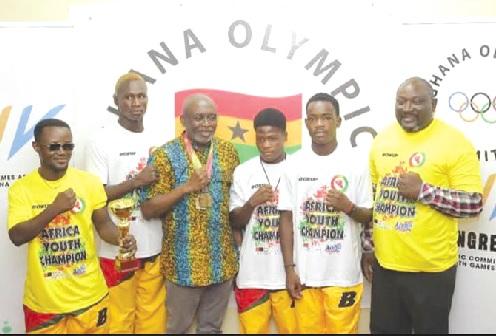GOC President, Richard Akpokavie, (3rd left) with the Black Rockets boxers and some officials